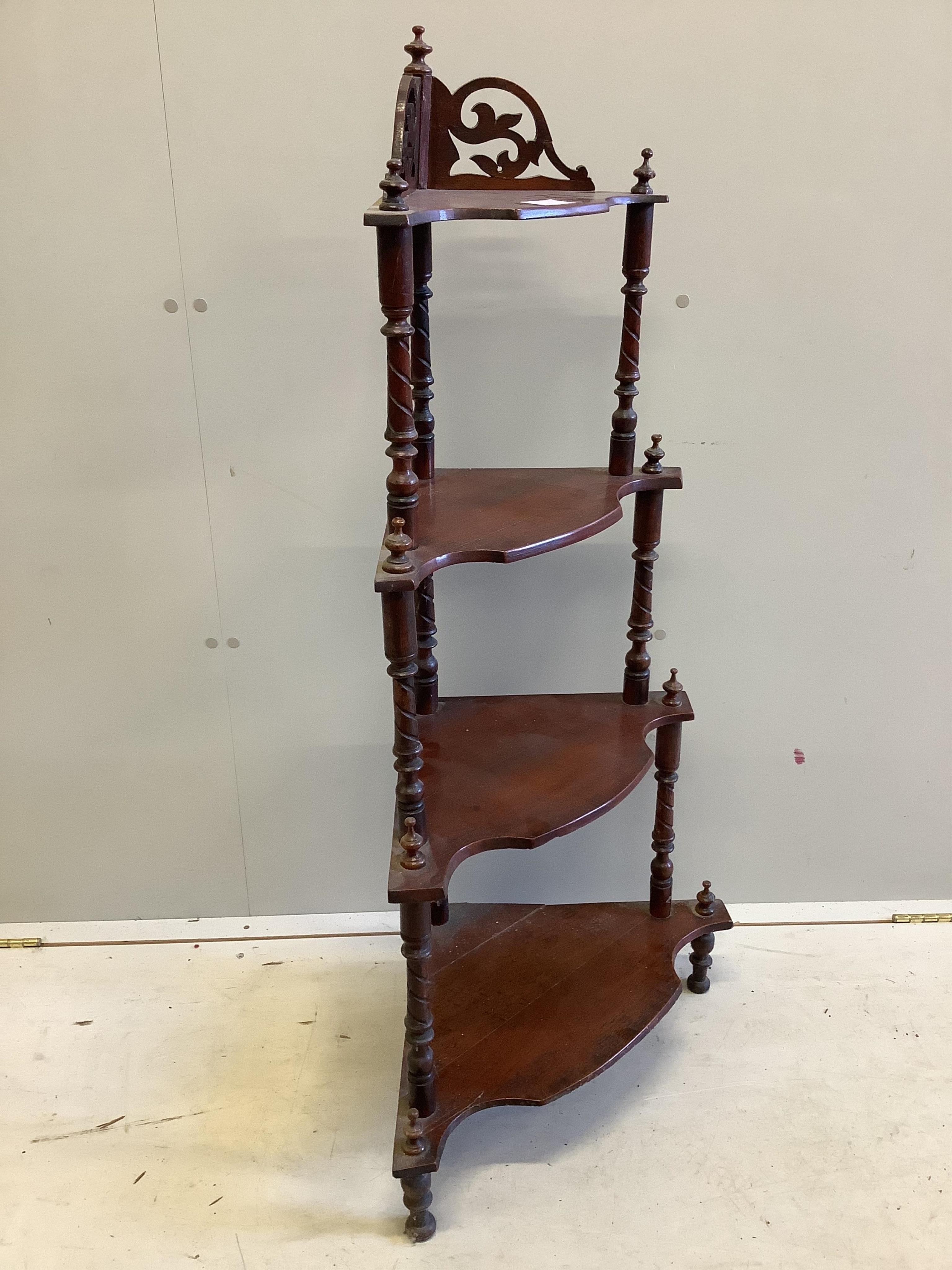 A Victorian mahogany four tier graduated corner whatnot, width 60cm, depth 35cm, height 116cm. Condition - fair